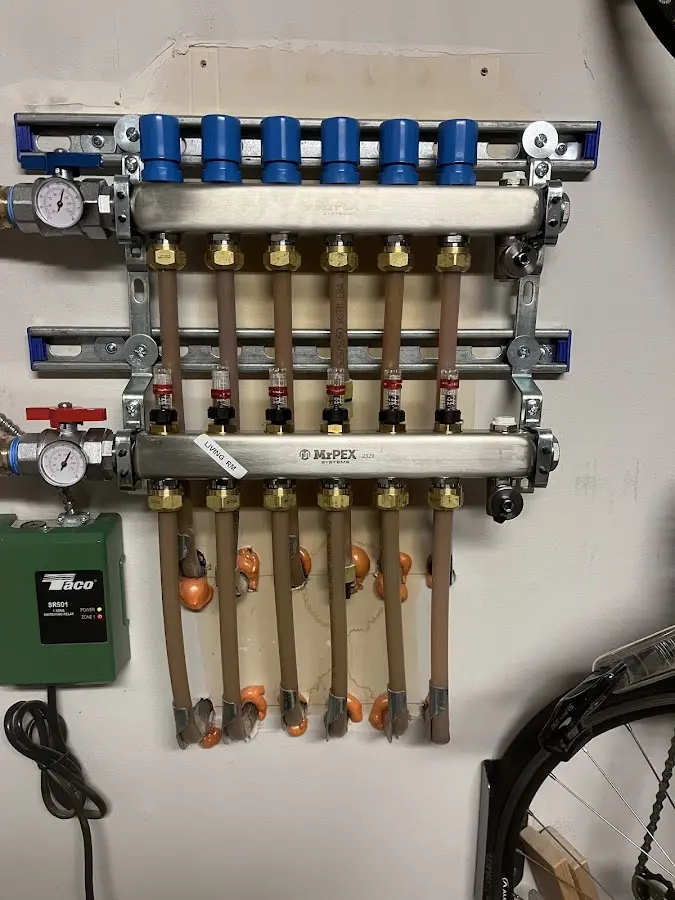 Plumber performing Gas Line Installation at a residential property in Tigard